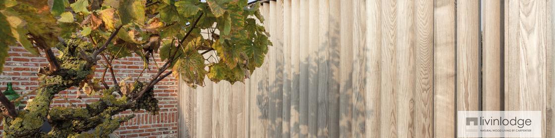 Wooden shutters for privacy and protection on patio