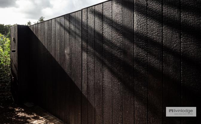 Modern gate in black charred wood, Sint-Martens-Latem