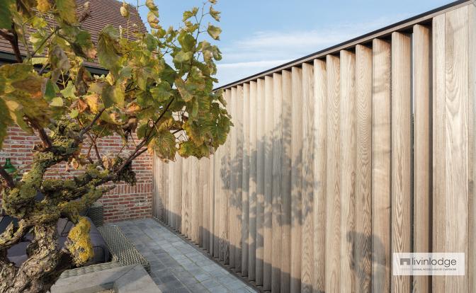 Wooden shutters for privacy and protection on patio