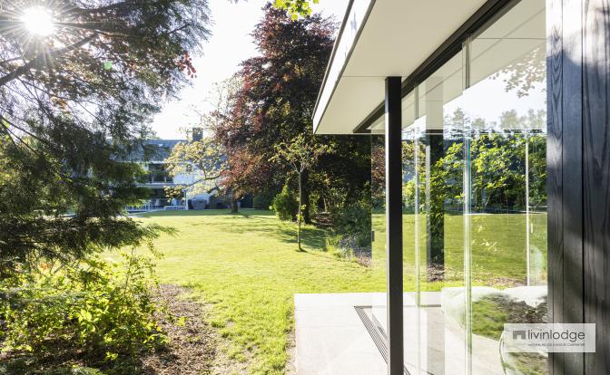 Modern garden room with sliding glass doors