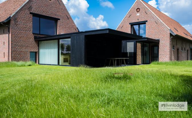 Modern black timber-frame extension