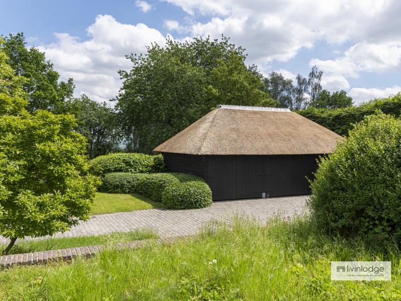 Oak outbuilding with thatched roof