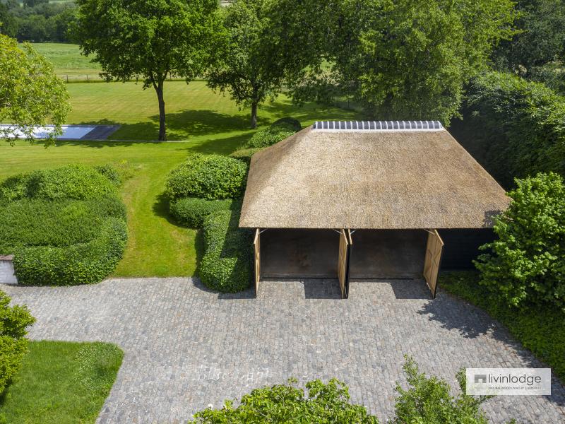 Oak outbuilding with thatched roof