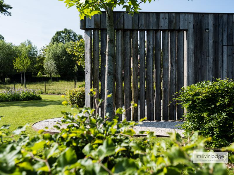 Wooden outbuilding with barnwood cladding 