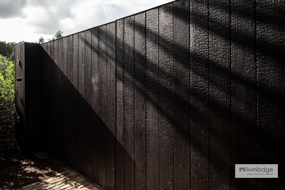 Modern gate in black charred wood, Sint-Martens-Latem