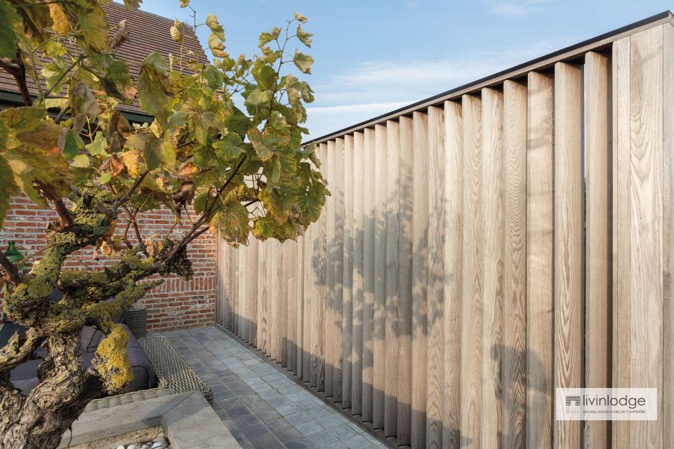 Wooden shutters for privacy and protection on patio