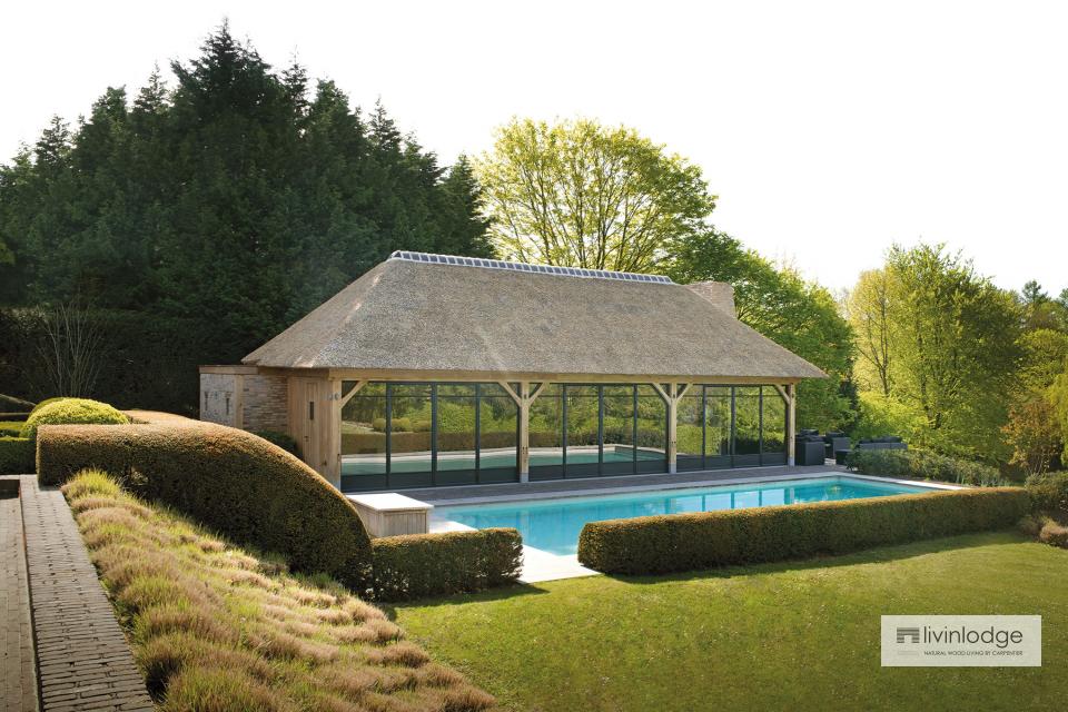 Exclusive two-level pool house with thatched roof, Ronse